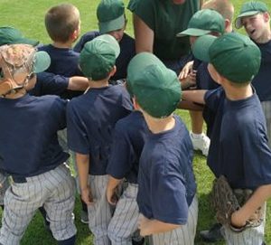 Image of baseball team and coach