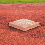 youth-baseball-team-having-a-team-meeting-huddle-on-the-field