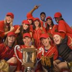 team-photo-after-winning-tournament-posing-with-trophy