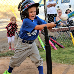 tee-ball-player-swinging-bat-at-ball-on-tee-300x300