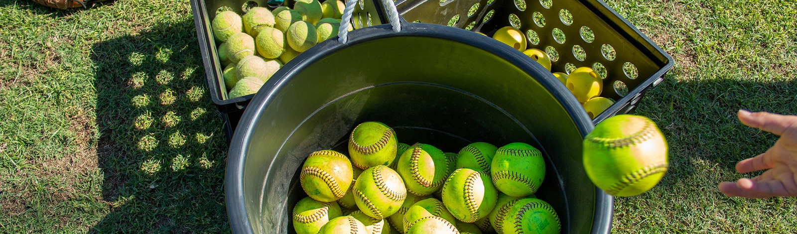 bucket-of-practice-softballs-for-team-clinics