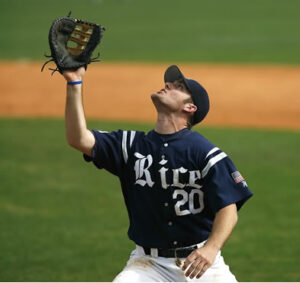 baseball-player-practicing-defense-at-adult-baseball-team-clinic