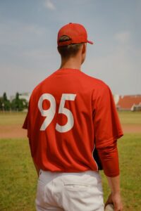 ball-player-in-the-outfield-standing-in-position-during-a-game